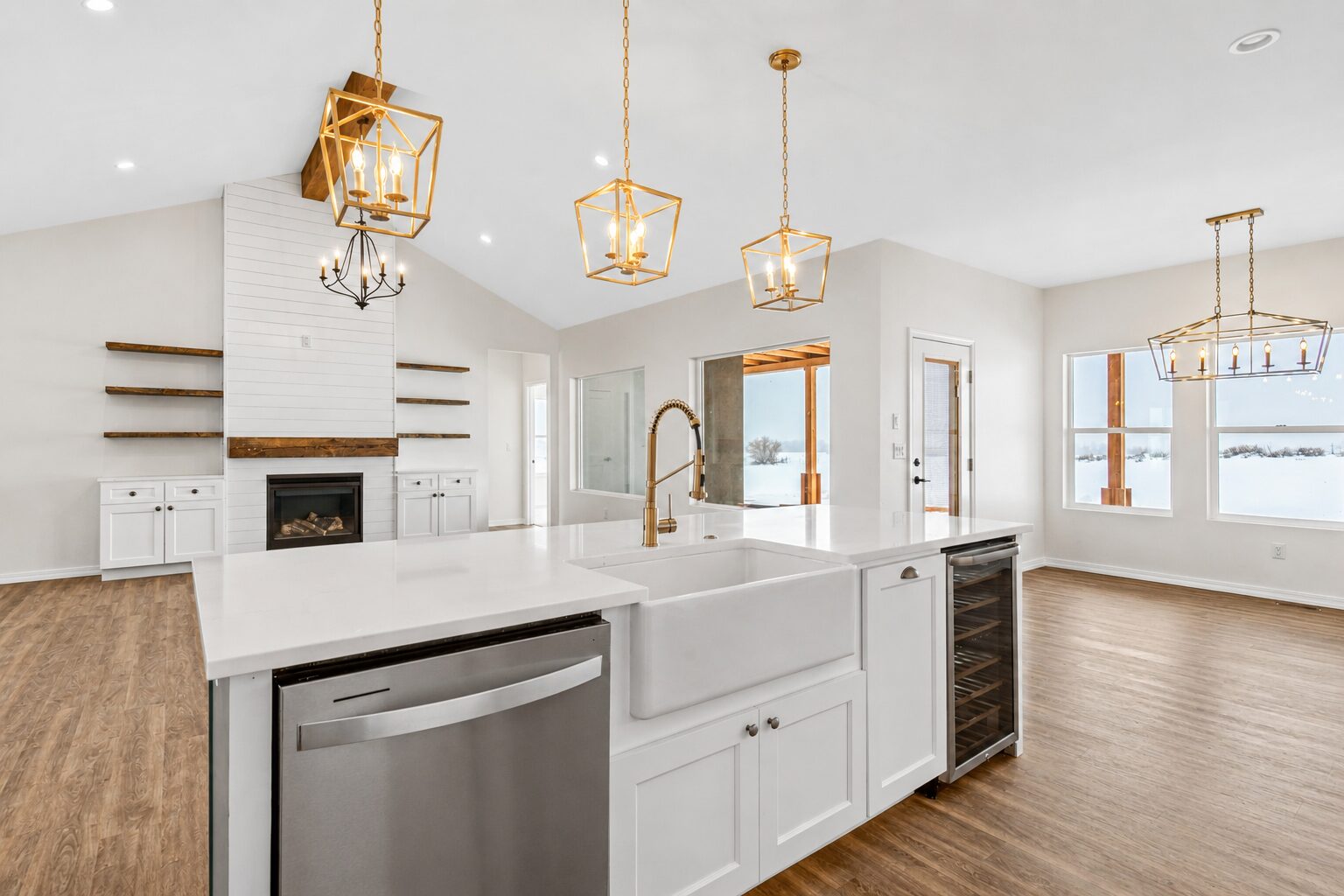 Living room to kitchen with white shaker cabinets