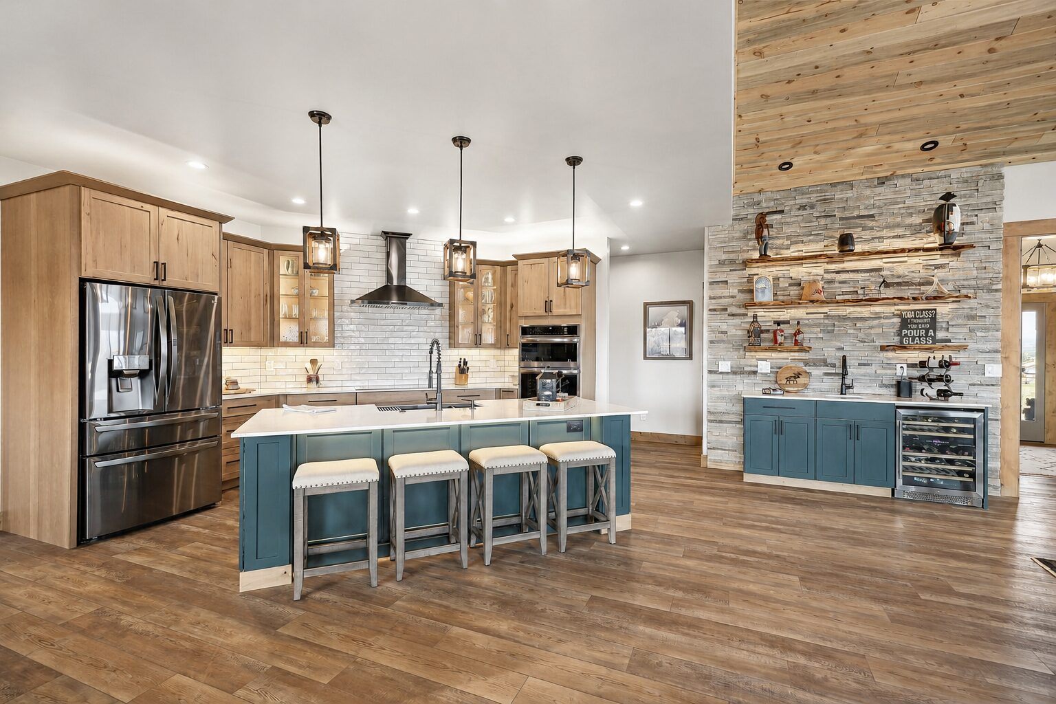 Custom kitchen with teal island and stone accents
